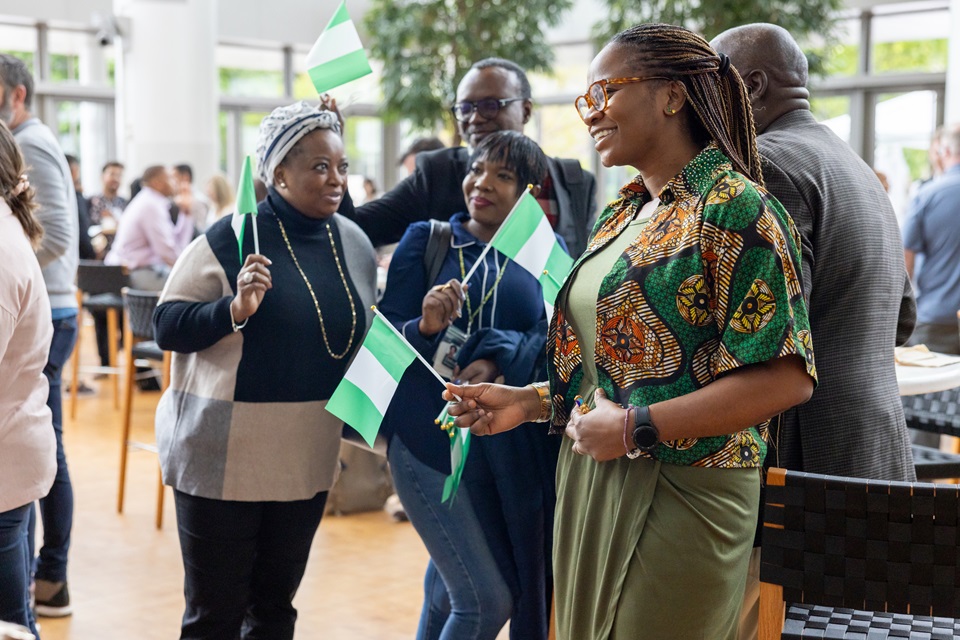 Foundation staff socialize during the welcome breakfast at the Annual Employee Meeting at the Alina and Bijan Gates Foundation in Seattle, Washington, on May 9, 2023.