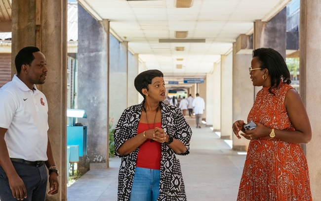 Dr. Loice Achieng Ombajo, Dr. Shikoh Gitau, and Dr. Thumbi Mwangi discuss an upcoming meeting at The Center for Epidemiological Modelling and Analysis (CEMA) at the University of Nairobi in Nairobi, Kenya. 