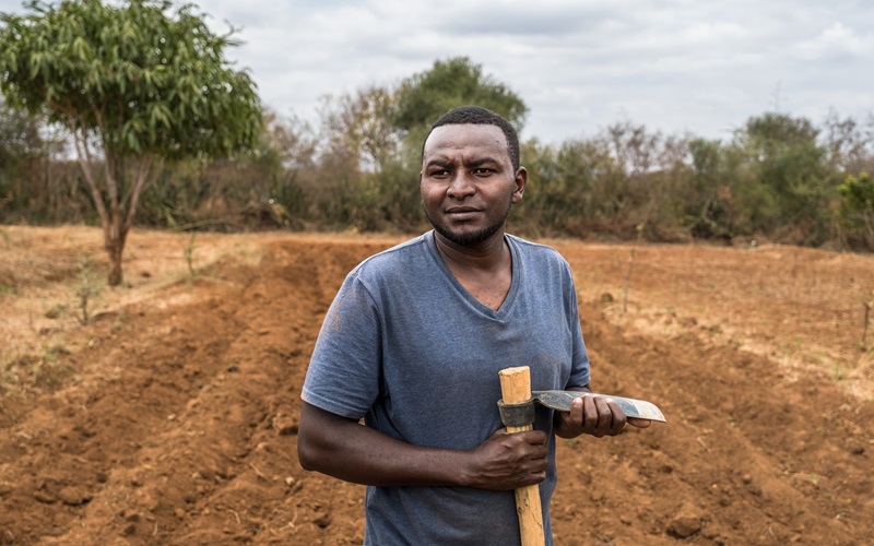 James Mutinda at his farm in Machakos County, Kenya. In the video above, James shares his ambitions stemming from his passion in sustainable farming.